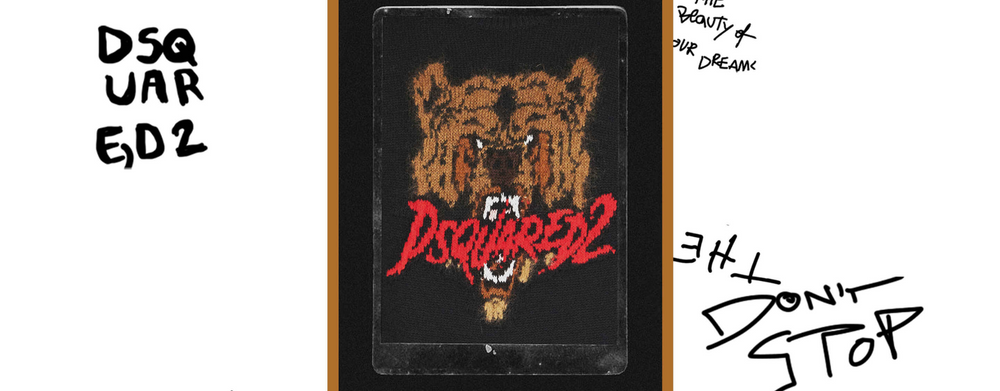 Gesticktes Bild eines Bärens mit dem Schriftzug Dsqaured2 im aufgerissenen Maul