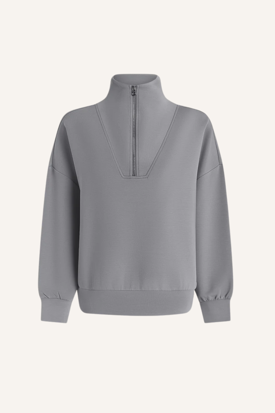 Oversized geschnittener Pullover mit halbem Reißverschluss am Kragen, tiefen Ärmelbündchen und breitem Saumbund in babyblau