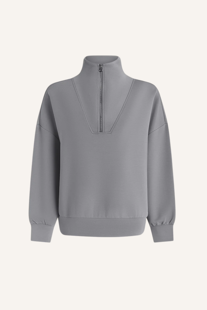 Oversized geschnittener Pullover mit halbem Reißverschluss am Kragen, tiefen Ärmelbündchen und breitem Saumbund in babyblau