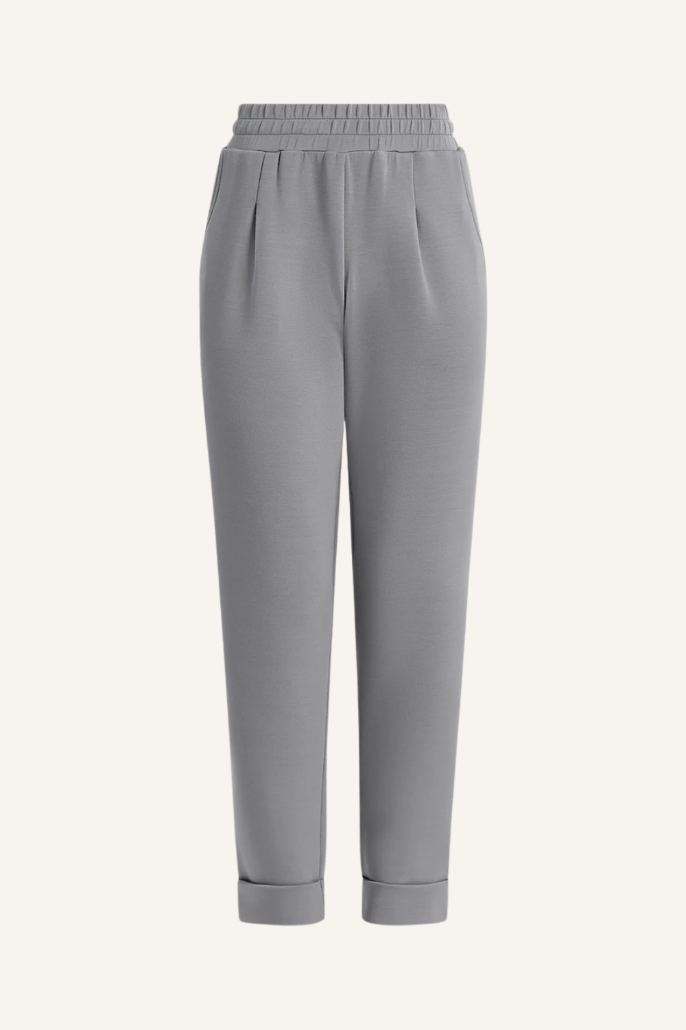 Schmal geschnittene Hose mit konisch zulaufendem Bein, elegantem Umschlag am Saum, geformten Taschen und Abnähern vorne am Bund
