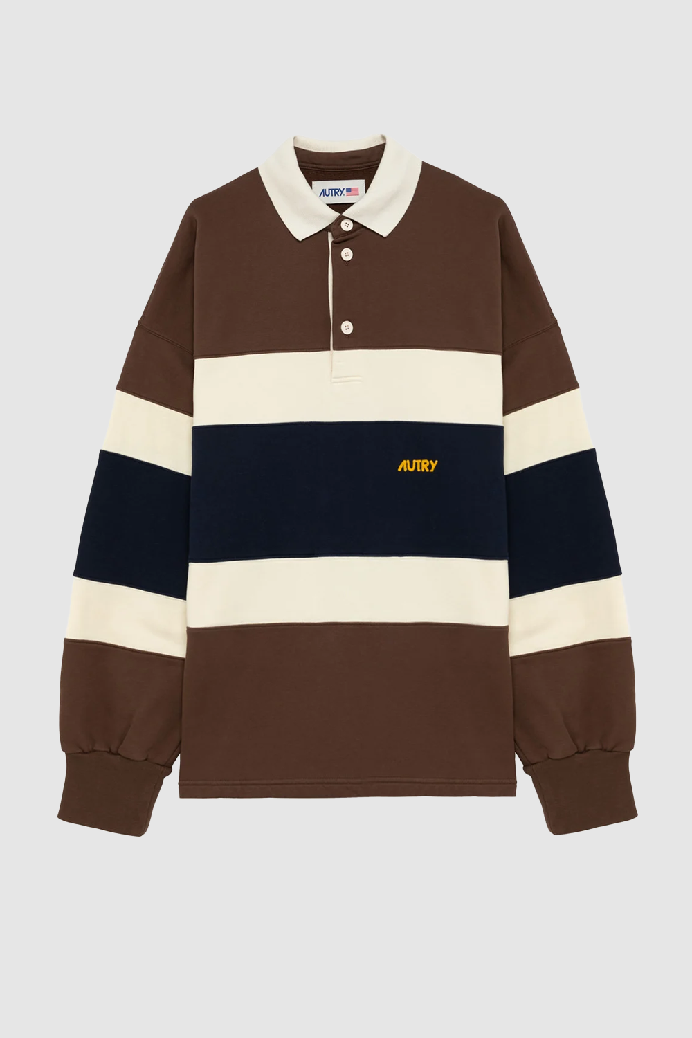 Poloshirt Unisex im Rugby-Stil von Autry aus Baumwollfleece mit Kragen und Ärmelbündchen aus Rippstrick. Das Modell ist mit einem braun, weiß und blau gestreiften Muster versehen.